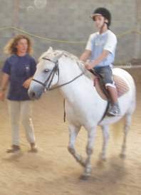 Le fiston maîtrise la situation, le cheval ça le connait !